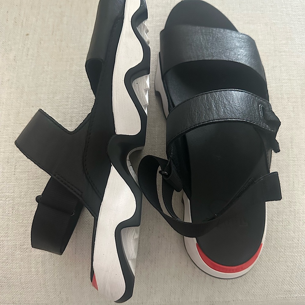 Sorel Sandals. Size 10.5. Black & White with touch of orange.